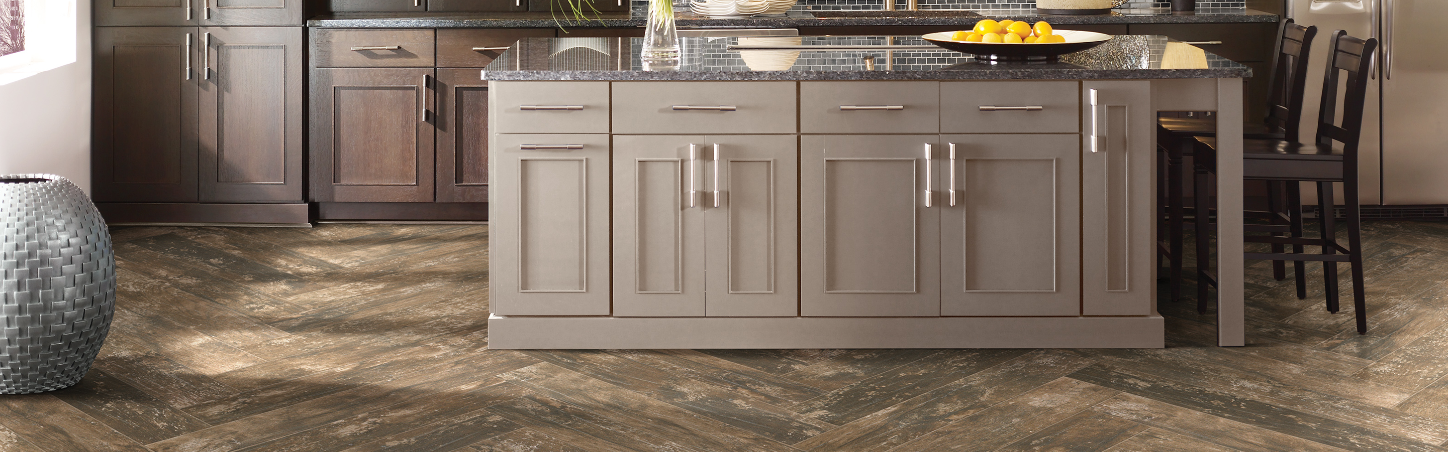 kitchen island dark herringbone tile 