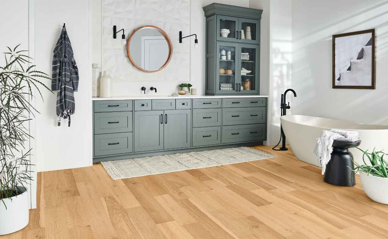 Engineered waterproof oak hardwood in bath with standing tub 